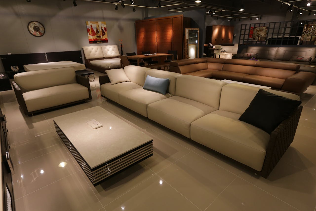 Services-02 Elegant living room showcasing modern furniture with plush sofas and ambient lighting.